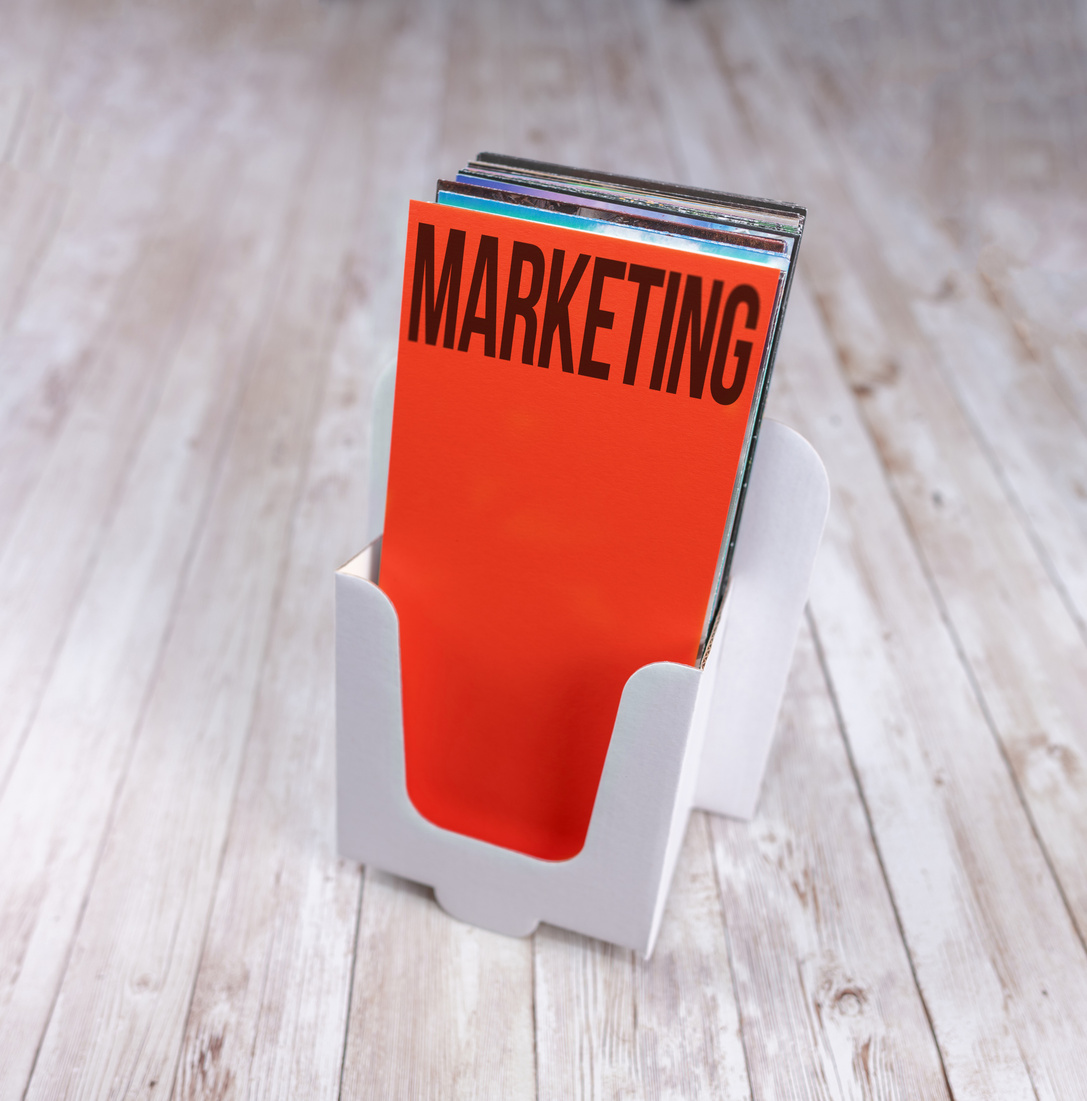 Concept of traditional marketing with flyer leaflets